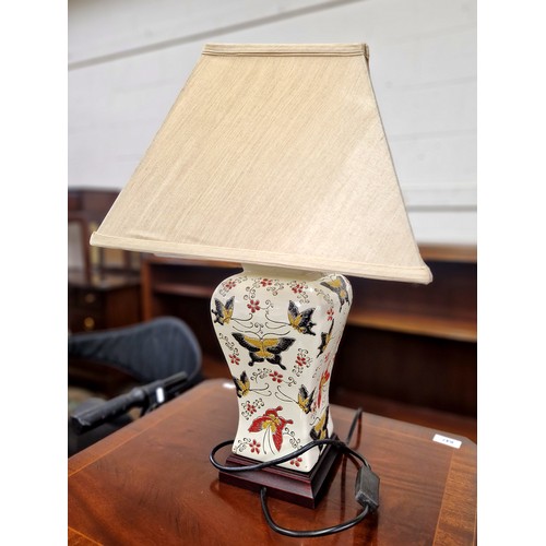 670 - Table lamp with butterfly & floral design