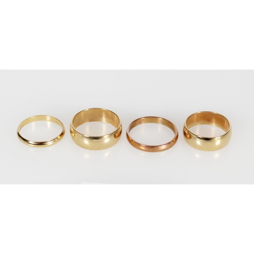 408 - Four yellow metal wedding bands.