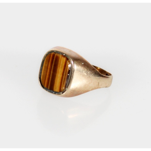 419 - 9ct gold and tigers eye signet ring, size S, 4.1g.