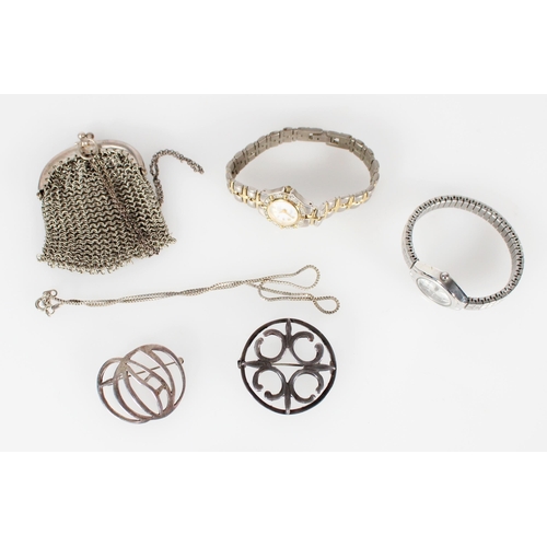 441 - Two Scottish silver brooches, two costume watches and a small chain link purse.