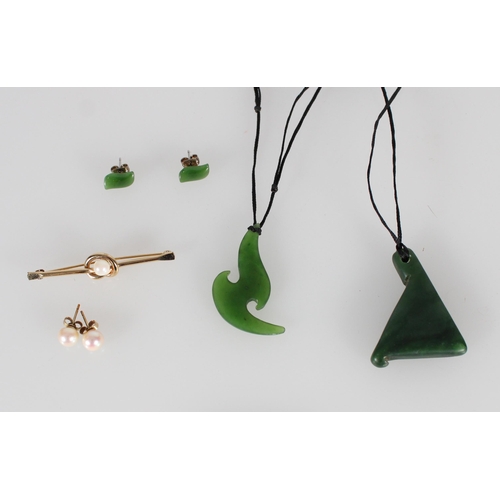 449 - Two New Zealand jade pendants, a pair of earrings and a pearl brooch and earrings.