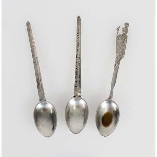 487 - Three Egyptian silver teaspoons, 43g.