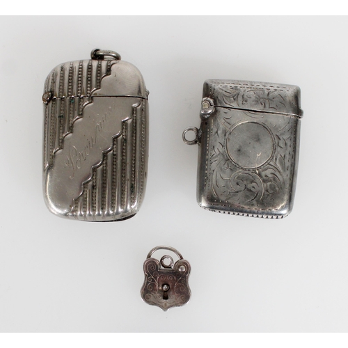 488 - Hallmarked silver vesta case, silver padlock clasp and a plated vesta (3)