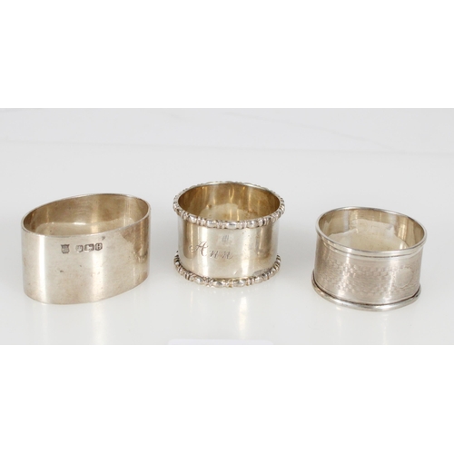 491 - Three hallmarked silver napkin rings, 88g.