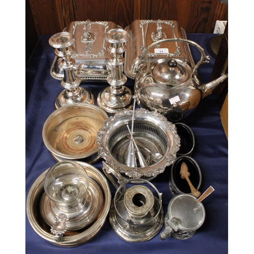 11 - Silver-plate to include entrée dishes, a kettle, a pair of candlesticks, wine coasters, etc.