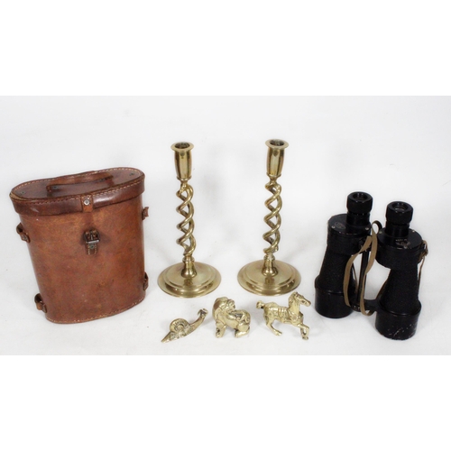 25 - Pair of Ross of London MKII binoculars, a pair of brass candlesticks and brass figurines.