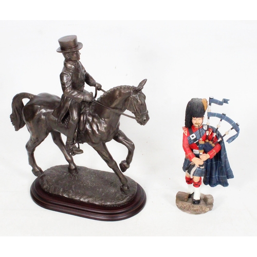 5 - Cold cast bronzed resin model of a jockey and horse, and a Stirling Castle piper figure.