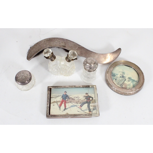 506 - Hallmarked silver items to include small photo frames, a crumb brush, an oil and vinegar bottle and ... 