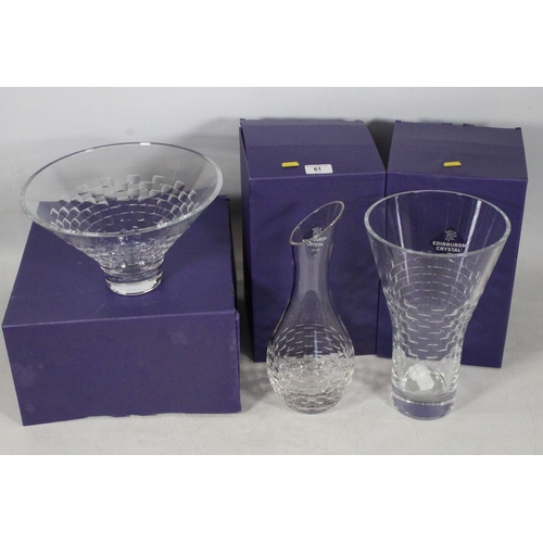 61 - Edinburgh Crystal to include a glass bowl and two vases.