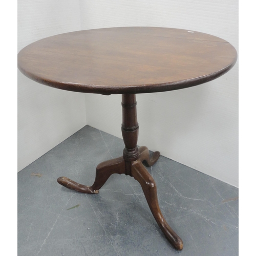 420 - George III mahogany snap-action tripod table with saucer top, approximately 70cm high.