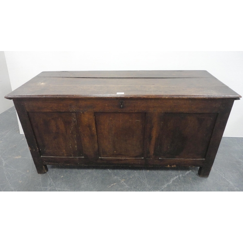 421 - 19th century oak coffer with hinged top enclosing a pine candle box, three-panel front, iron lock, o... 