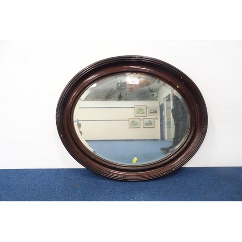 519 - Oval wall mirror.