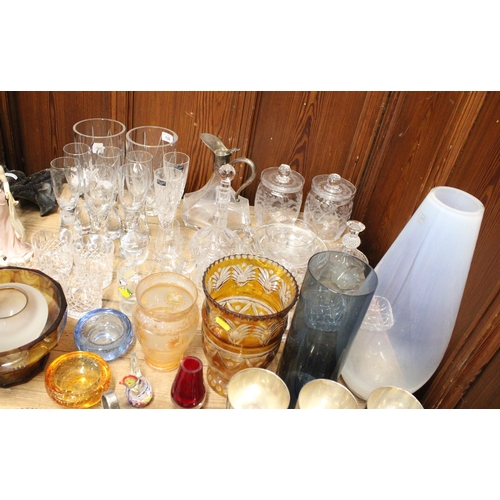 139 - Glassware to include Stuart Crystal, looking glasses, a silver-plated ewer, a pair of etched glass b... 