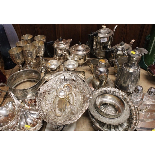 141 - Silver-plated ware to include six goblets, two four-piece teasets, a swing-handled basket, etc.