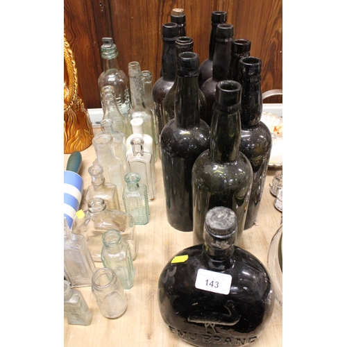 143 - Vintage glass bottles to include the Emu brand, California Fig Syrup, San Francisco, etc.