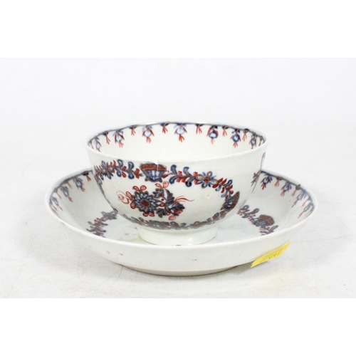 196 - English 18th century tea bowl and saucer.