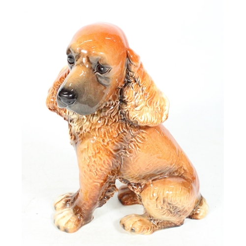 203 - Goebel pottery model of a spaniel puppy, 29cm high.