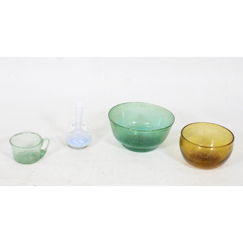 226 - Four pieces of glass to include an opalescent glass squat baluster vase with flaring rim and scroll ... 