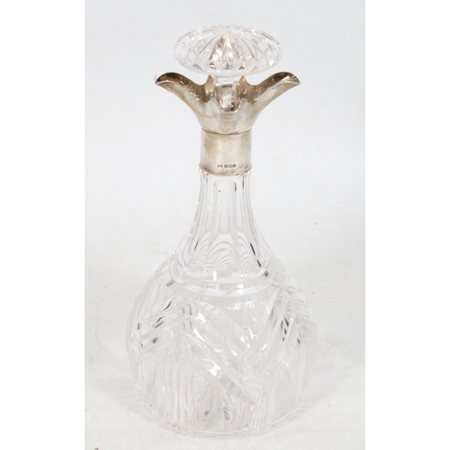 240 - Glass and hallmarked silver decanter.