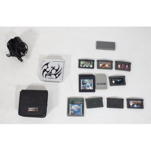 243 - Nintendo Gameboy Advance and games to include Pokemon, Yoda Stories, etc.