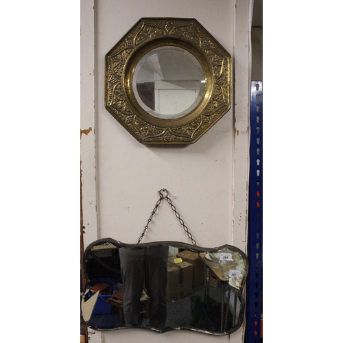 264 - Toilet mirror and a brass framed circular mirror.