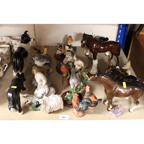 291 - Animal and bird models, a Lladro figure, etc.