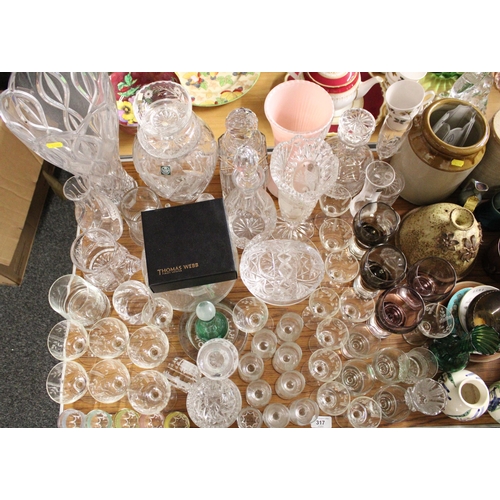 317 - Glassware to include vases, decanters, etc.