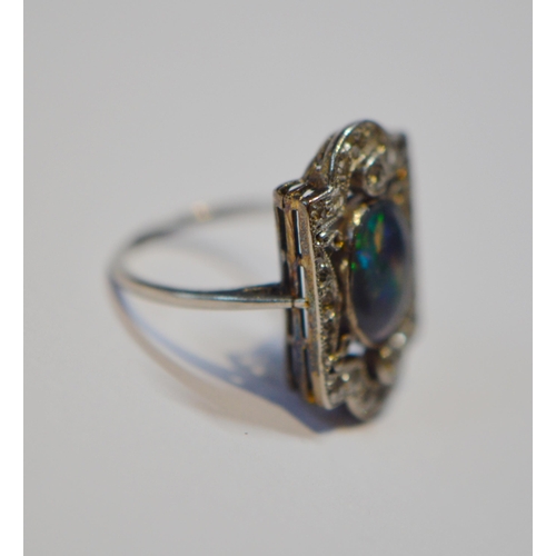 174 - Art Deco period black opal and diamond plaque ring, set with an oval black cabochon opal and various... 