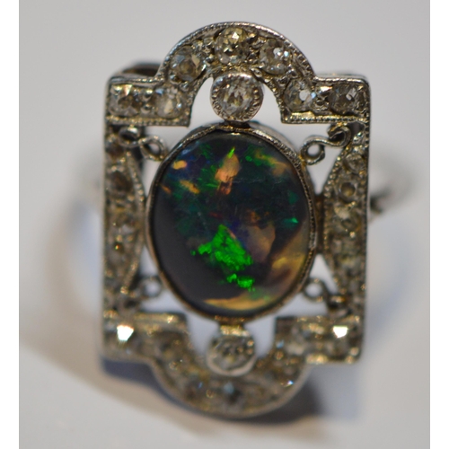 174 - Art Deco period black opal and diamond plaque ring, set with an oval black cabochon opal and various... 