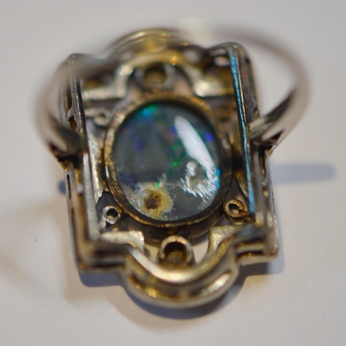 174 - Art Deco period black opal and diamond plaque ring, set with an oval black cabochon opal and various... 