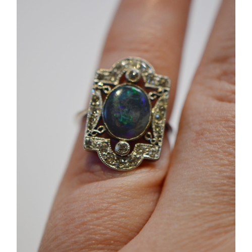 174 - Art Deco period black opal and diamond plaque ring, set with an oval black cabochon opal and various... 