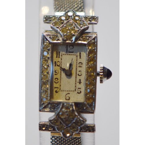 282 - Lady's 925 silver, chrome and paste evening watch, cabochon crown on Milanese bracelet, c. 1940.