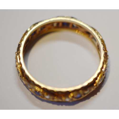 191 - 9ct gold eternity ring, gem-set, size Q, 3.3g gross.