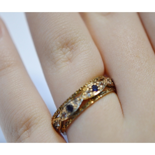 191 - 9ct gold eternity ring, gem-set, size Q, 3.3g gross.