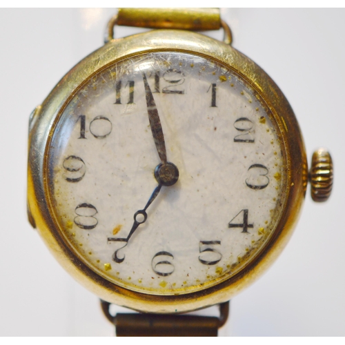 283 - Gent's 9ct gold watch in bubble back-style case, c. 1930, and a similar lady's 9ct gold backed watch... 