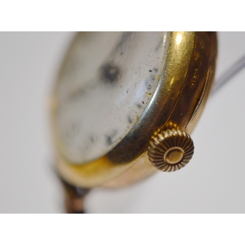 283 - Gent's 9ct gold watch in bubble back-style case, c. 1930, and a similar lady's 9ct gold backed watch... 