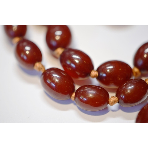 192 - Cherry amber bead necklace, 45cm long, 73g.