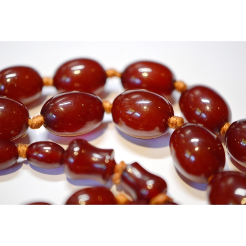 192 - Cherry amber bead necklace, 45cm long, 73g.