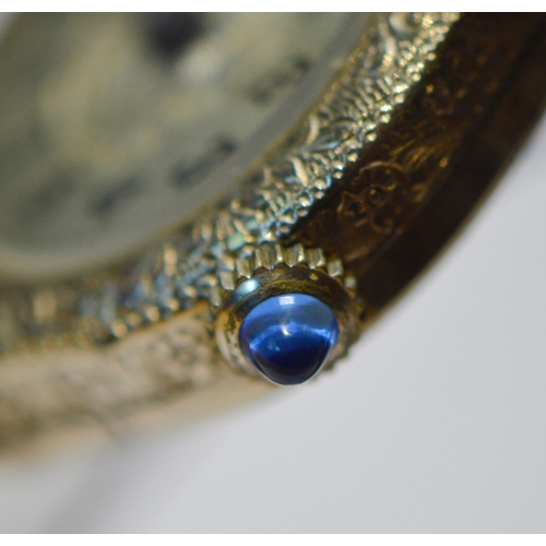 284 - Lady's Dominant evening watch in white gold filled case, with cabochon crown, c. 1930.