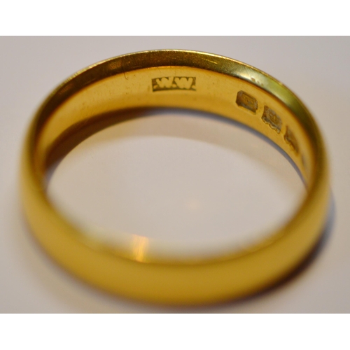 203 - 22ct gold lady's band ring, hallmarks for London, size N, 6.2g.