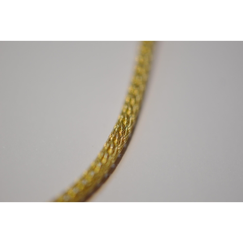 206 - Continental 18ct gold necklace and matching bracelet, with fluted beads, '.750', 22.6g gross.