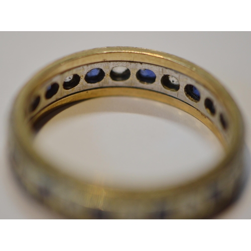 210 - 9ct white and yellow gold eternity ring, size Q, 3.7g gross.