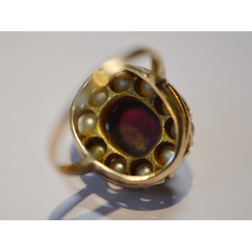 211 - Garnet and pearl cluster ring and another, three-stone ring, both 9ct gold, size P and R, 8.4g gross... 