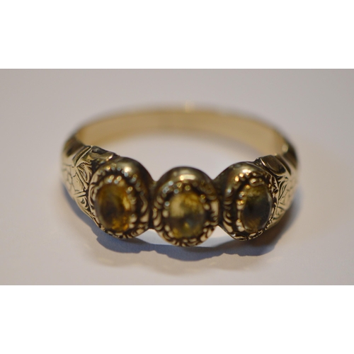 228 - Early 19th century three-stone paste ring in engraved gold and an obsidian ring in 9ct gold, size N ... 