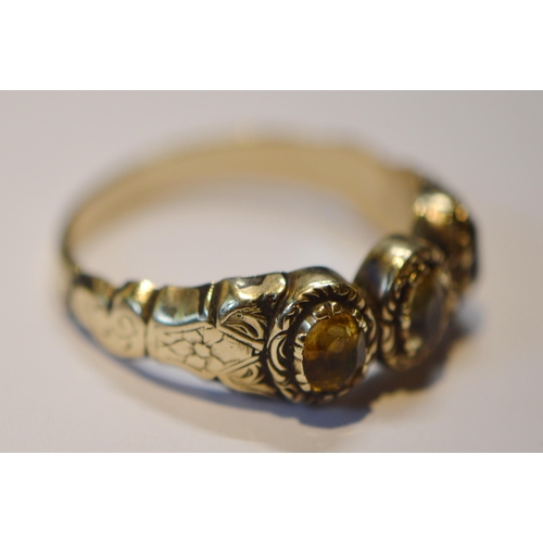 228 - Early 19th century three-stone paste ring in engraved gold and an obsidian ring in 9ct gold, size N ... 