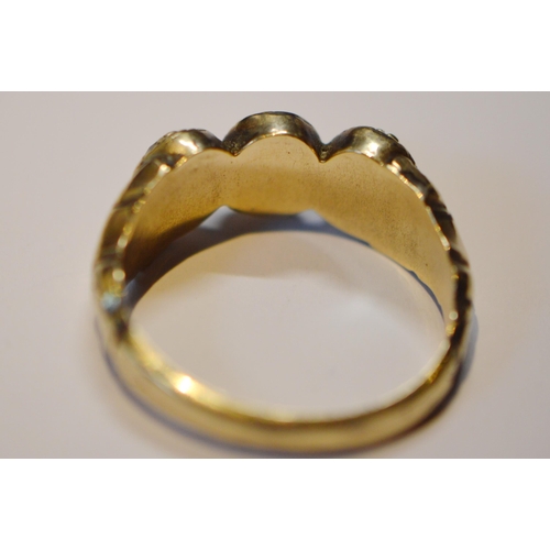 228 - Early 19th century three-stone paste ring in engraved gold and an obsidian ring in 9ct gold, size N ... 