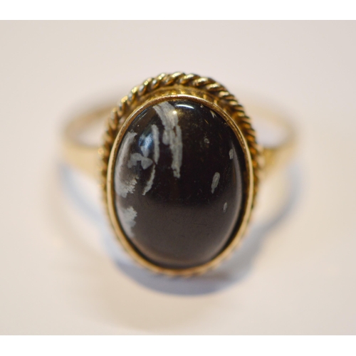 228 - Early 19th century three-stone paste ring in engraved gold and an obsidian ring in 9ct gold, size N ... 