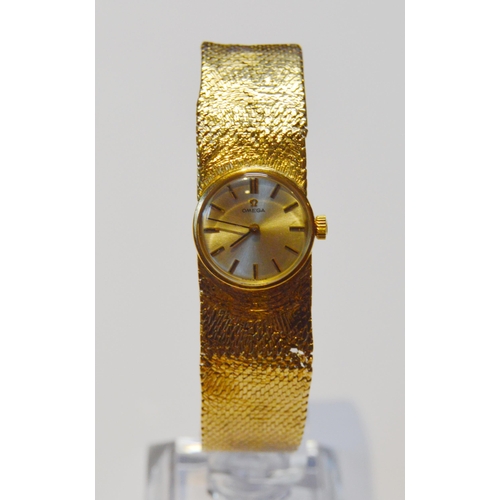 295 - Omega 9ct gold lady's bracelet watch, c. 1960, 39.5g gross.