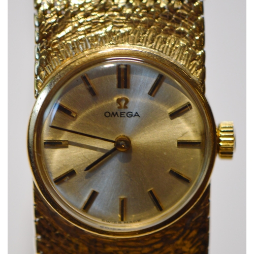 295 - Omega 9ct gold lady's bracelet watch, c. 1960, 39.5g gross.