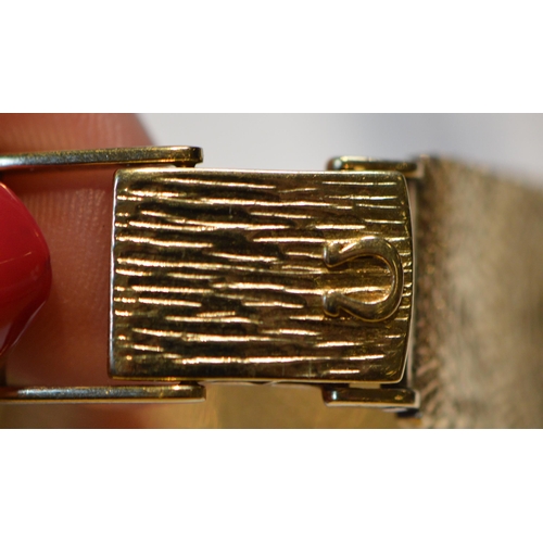 295 - Omega 9ct gold lady's bracelet watch, c. 1960, 39.5g gross.